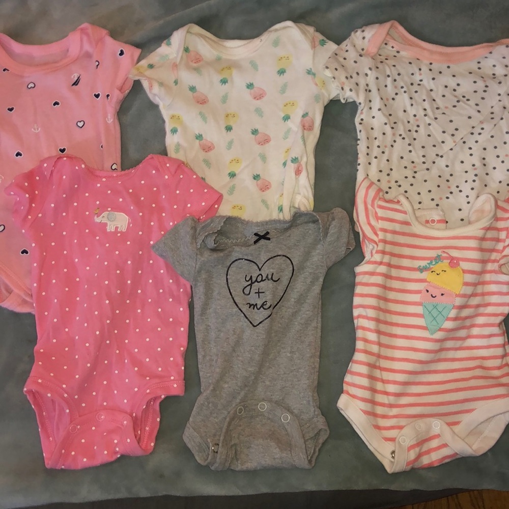 Set of six 6 female onesies.
